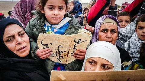 Image of people and children of two Syrian Shiite towns.