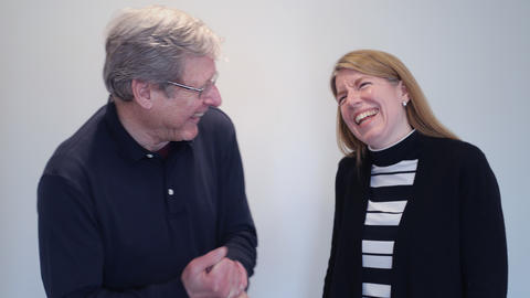 Image of Jeffry Frieden and Christina Davis laughing