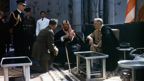 President Roosevelt shakes hands with King Ibn Saud, of Saudi Arabia, on board the US Navy heavy cruiser.