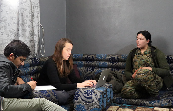 Image of Amy Austin Holmes conducting interviews