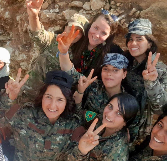 Holmes with members of the Syrian Democratic Forces