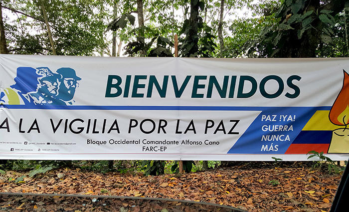 Banner in rural Colombia that has a message in Spanish that translates to 
