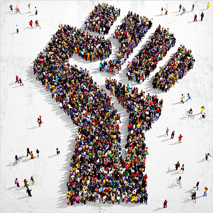 Image of raised fist made of people