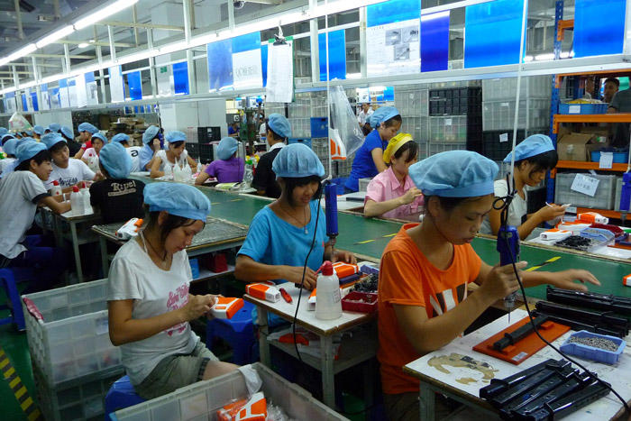 Image of workers in a Chinese Toy Factory