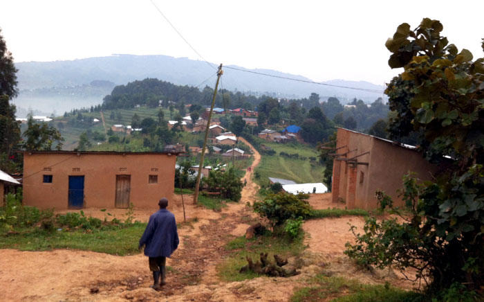 Image of man walking near Butaro Hospital