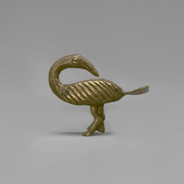 Gold statue of sankofa bird from the Brooklyn Museum