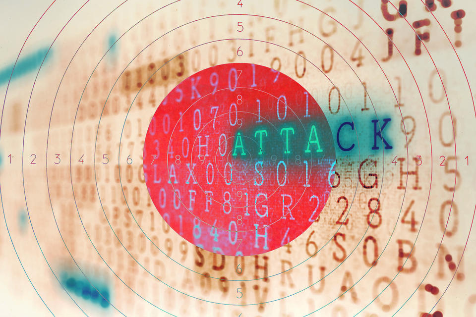 Illustration of rows of random numbers and letters with the word "attack" highlighted in blue, near a red bullseye.